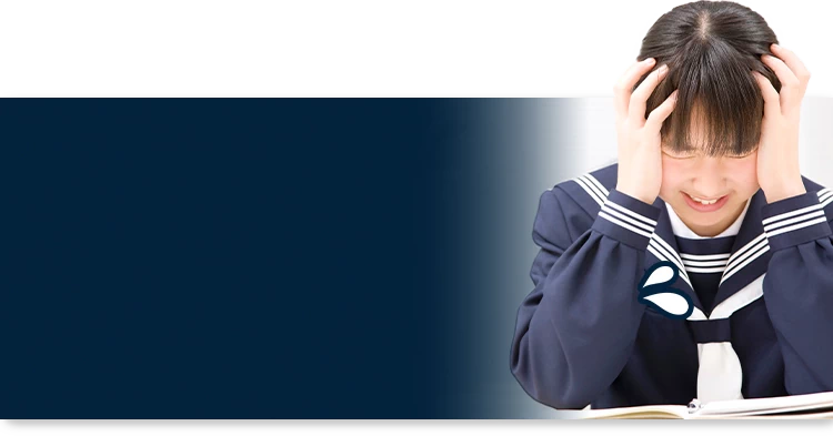 頭を抱える学生の画像